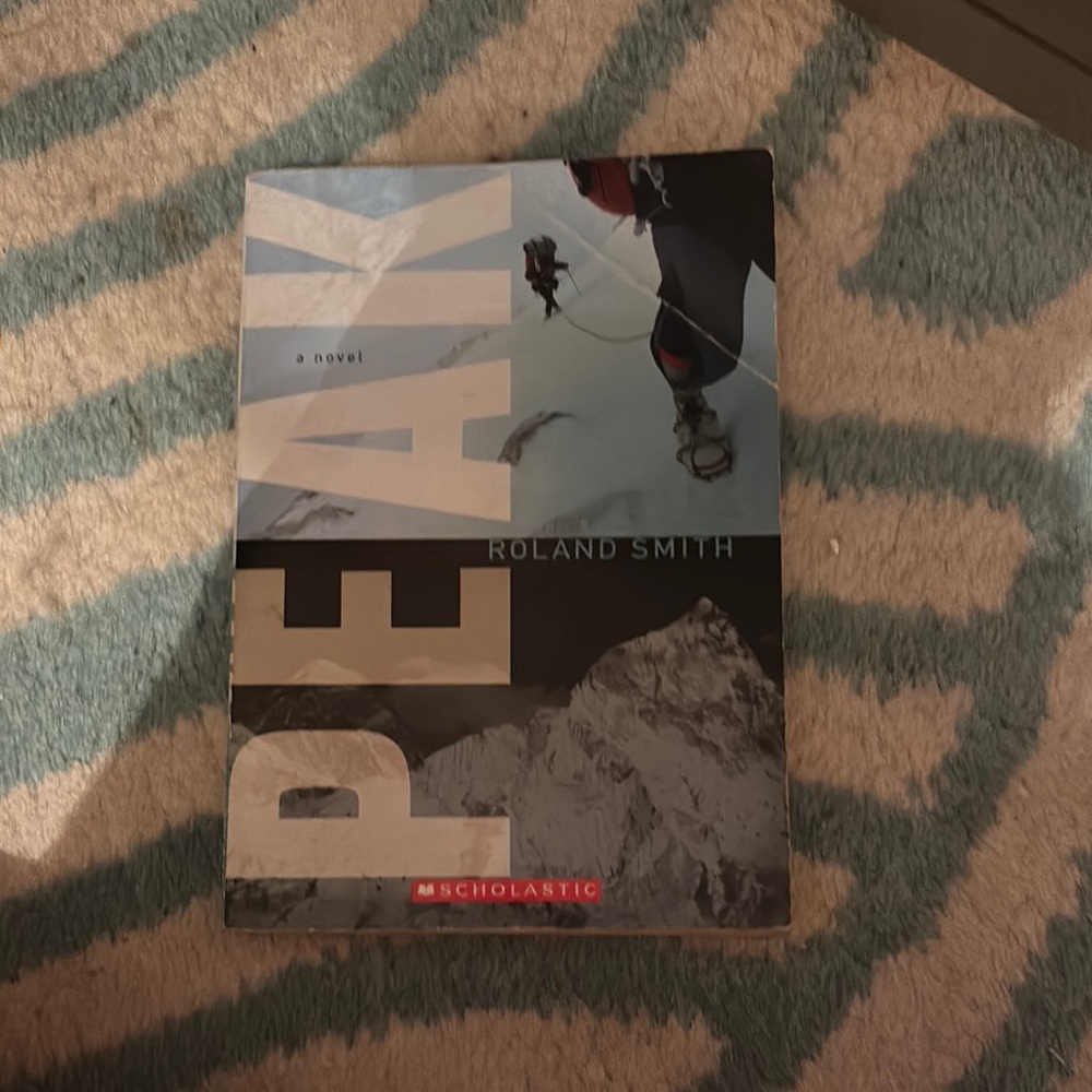 Scholastic Peak Novel with Blue and Black Cover